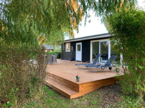 Spacey and charming cabin 300 m. from beach Øster-Ulslev